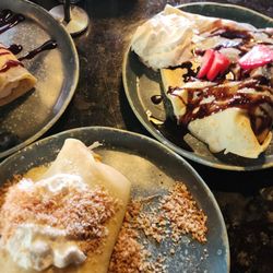 Lemon blueberry cheesecake crepe, coconut cream crepe, Nutella crepe