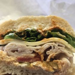 The Sonoma Spice! Turkey, pepper jack cheese, lettuce, tomato, mayo, jalapeños, and a home made secret spice sauce!