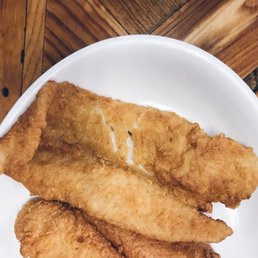 a plate of fried fish a plate of fried fish