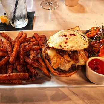 Ruggles Black - Lamb Burger with sweet potato fries and salad - New American Near Me - Houston, Texas Ruggles Black - Lamb Burger with sweet potato fries and salad - New American Near Me - Houston, Texas