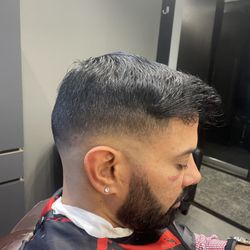One Man Barbershop - Mid Drop Low Fade
