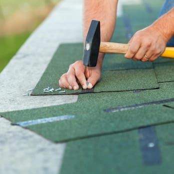 Sunshine Exteriors - a man using a hammer to repair a roof - Roofing Near Me - Barrington, Illinois Sunshine Exteriors - a man using a hammer to repair a roof - Roofing Near Me - Barrington, Illinois