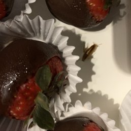 chocolate covered strawberries in paper liners