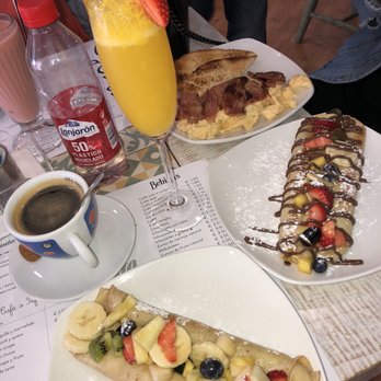 Otto - Fruit crepe with maple syrup. Mimosas. Fruit crepe with Nutella. English breakfast of eggs and bacon. - Cafeteria Near Me - Seville, SE