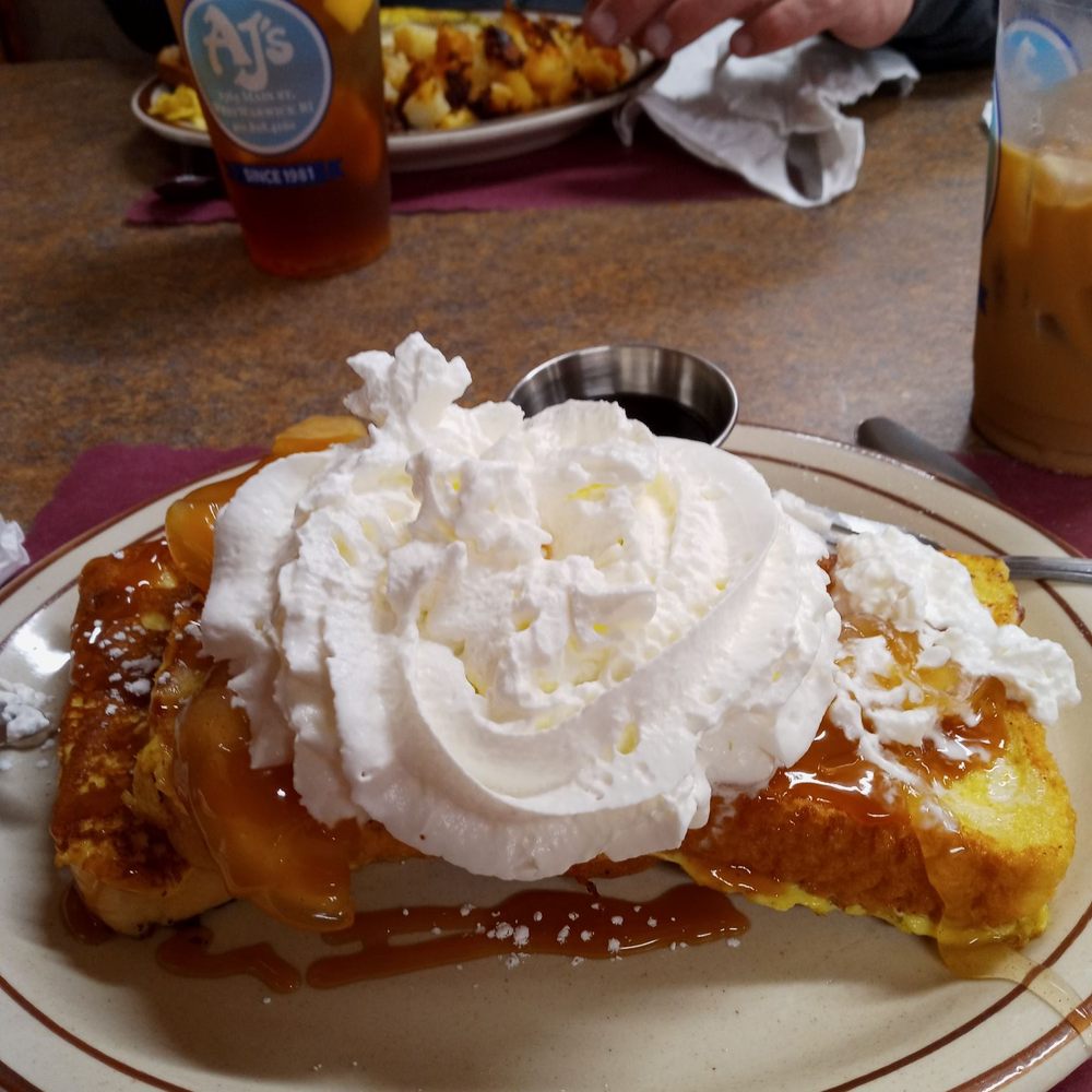 A J's Restaurant - Fall harvest French toast with apples, pecans, caramel drizzle and whipped cream (and it comes with warm syrup) - Breakfast & Brunch Near Me - West Warwick, Rhode Island A J's Restaurant - Fall harvest French toast with apples, pecans, caramel drizzle and whipped cream (and it comes with warm syrup) - Breakfast & Brunch Near Me - West Warwick, Rhode Island