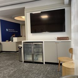 The lounge with broken refrigerator and warm water!