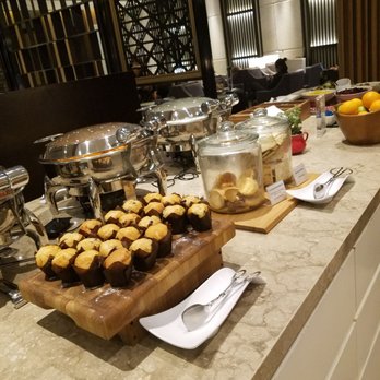 Plaza Premium Lounge Arrivals - Priorty pass access at Plaza lounge. A bunch of small bites with Indian cuisine - Airport Lounges Near Me - Longford, XGL Plaza Premium Lounge Arrivals - Priorty pass access at Plaza lounge. A bunch of small bites with Indian cuisine - Airport Lounges Near Me - Longford, XGL