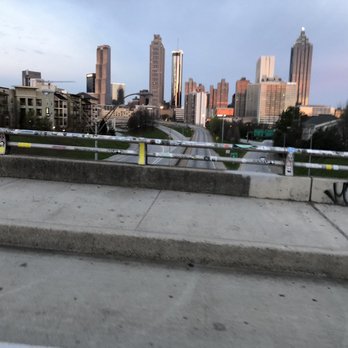 Publix Georgia Marathon & Half Marathon - 3.18.2018: Slanted shot of the city of Atlanta on the Jackson Street Bridge (taking a photo while on the run, lol) - Races & Competitions Near Me - Atlanta, Georgia Publix Georgia Marathon & Half Marathon - 3.18.2018: Slanted shot of the city of Atlanta on the Jackson Street Bridge (taking a photo while on the run, lol) - Races & Competitions Near Me - Atlanta, Georgia