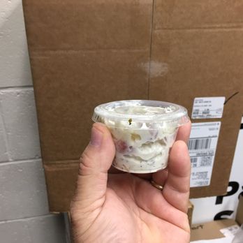 Grove Road Deli - a hand holding a cup of yogurt - Sandwiches Near Me - Greenville, South Carolina