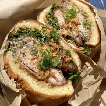 Mae Tao & Sons - Cambodian fried sando Two battered thigh chicken, pickled cabbage, black garlic aioli, on brioche. Moist, delicious, flavorful, not spicy. - Food Trucks Near Me - Orlando, Florida Mae Tao & Sons - Cambodian fried sando Two battered thigh chicken, pickled cabbage, black garlic aioli, on brioche. Moist, delicious, flavorful, not spicy. - Food Trucks Near Me - Orlando, Florida