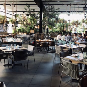 Herringbone Waikiki - Beautiful decor in the indoor/outdoor dining space - Seafood Near Me - Honolulu, Hawaii Herringbone Waikiki - Beautiful decor in the indoor/outdoor dining space - Seafood Near Me - Honolulu, Hawaii
