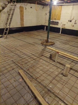 Concrete Basement Project - Our team was hired to place concrete in our clients basement!