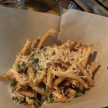 District Kitchen & Cocktails - Truffle fries - New American Near Me - Austin, Texas District Kitchen & Cocktails - Truffle fries - New American Near Me - Austin, Texas
