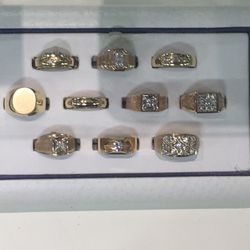 Men's gold ring selections. They have a huge white selection too and many variations!