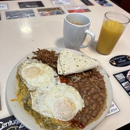 2 cheese enchiladas with red and green chili (Christmas) 2 over easy eggs, beans, hash browns, & a tortilla 2 cheese enchiladas with red and green chili (Christmas) 2 over easy eggs, beans, hash browns, & a tortilla