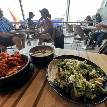 Root Down DIA - Faro and kale salad, carrot bisque with Thai seasonings and chutney, waffle sweet potato fries - New American Near Me - Denver, Colorado Root Down DIA - Faro and kale salad, carrot bisque with Thai seasonings and chutney, waffle sweet potato fries - New American Near Me - Denver, Colorado