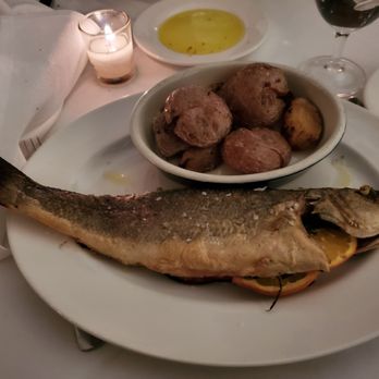 Bottino - Roasted and baked branzino whole with potatoes - Italian Near Me - New York, New York Bottino - Roasted and baked branzino whole with potatoes - Italian Near Me - New York, New York