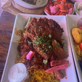 Mazra - 6hr Lamb Shank Plate - Mediterranean Near Me - San Bruno, California Mazra - 6hr Lamb Shank Plate - Mediterranean Near Me - San Bruno, California