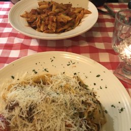 Spicy sausage penne and cheese smothered beef papardelle. Spicy sausage penne and cheese smothered beef papardelle.