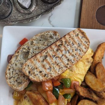 Utopia Caffe - Madrid omelette with their house potatoes. Turkish coffee. - Breakfast & Brunch Near Me - Tustin, California