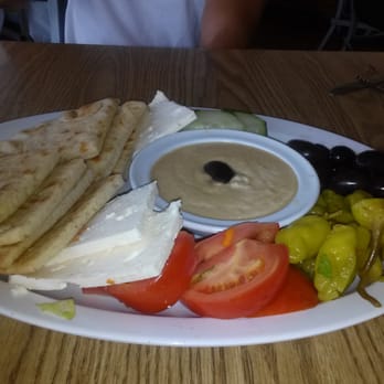 Olympic Cafe - Appetizer plate w/pita, hummus, feta, olives, cucumbers, tomatoes, and pepperocinis - Mediterranean Near Me - San Diego, California Olympic Cafe - Appetizer plate w/pita, hummus, feta, olives, cucumbers, tomatoes, and pepperocinis - Mediterranean Near Me - San Diego, California