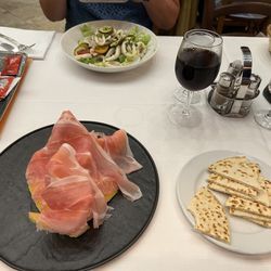 Al Molinetto - Melone mit Schinken als Vorspeise, außerdem Meeresfrüchtesalat