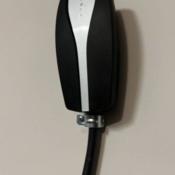 Ultralight Electric - Tesla mobile charger installed on wall - Electricians Near Me Ultralight Electric - Tesla mobile charger installed on wall - Electricians Near Me