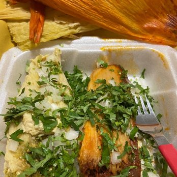 Lolis Tacos - Gandy - Chicken/green sauce tamale and pork/red sauce tamale. Onion & cilantro added. Scrumptious! - Mexican Near Me - Tampa, Florida Lolis Tacos - Gandy - Chicken/green sauce tamale and pork/red sauce tamale. Onion & cilantro added. Scrumptious! - Mexican Near Me - Tampa, Florida