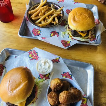 Jax Grill - Top: Backyard Barbecue Burger (w/o bacon) and fries Bottom: The Original Jax Burger w/cheese and hush puppies - Burgers Near Me - Bellaire, Texas