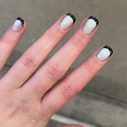 Dip nails with cat eye and black French tips Dip nails with cat eye and black French tips