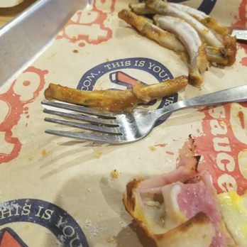 Arooga's Sports Tavern and Game Room - This is the actual size of there rib It's smaller than the fork - Bars Near Me - Patchogue, New York