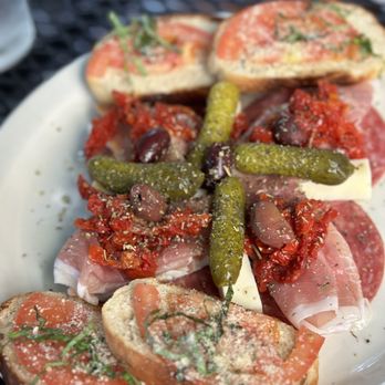 Nicola's - a plate of meat and vegetables - Italian Near Me - Omaha, Nebraska