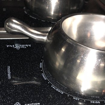 The Melting Pot - Fondue pots warming up for some fun! - Fondue Near Me - Austin, Texas The Melting Pot - Fondue pots warming up for some fun! - Fondue Near Me - Austin, Texas