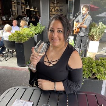 McClain Cellars - Enjoying my yummy wine while listening to the live music. - Wine Tasting Room Near Me - Laguna Beach, California