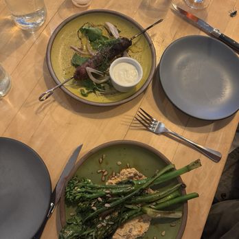 Table - Lamb and beef kefte kabob Broccolini with sunflower tahini - New American Near Me - Asheville, North Carolina