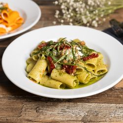 Mali Ston Wine Bar - Pesto Rigatoni Rigatoni tossed in vibrant basil pesto, sundried tomatoes and creamy stracciatella