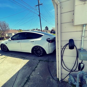 EV Charging Solutions - Outdoor 14-50 outlet in close proximity to my Tesla Model Y. - Electricians Near Me EV Charging Solutions - Outdoor 14-50 outlet in close proximity to my Tesla Model Y. - Electricians Near Me