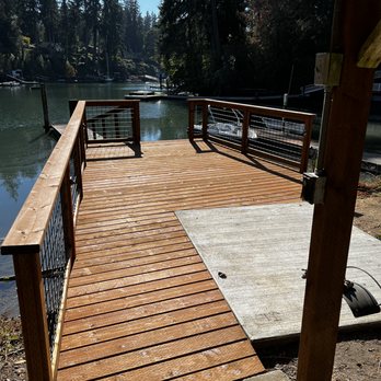 Fairbank Construction - Newly refurbished decking and added  safety railing with lighting. - General Contractors Near Me - Bainbridge Island, Washington