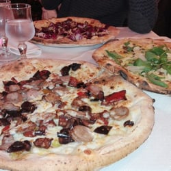 La Duchessa - Pizza norcina: salsiccia di norcia; melanzane a funghetto con pomodorini Pizze: tartufina e tartufata . tartufo, rucola e scaglie di grana.