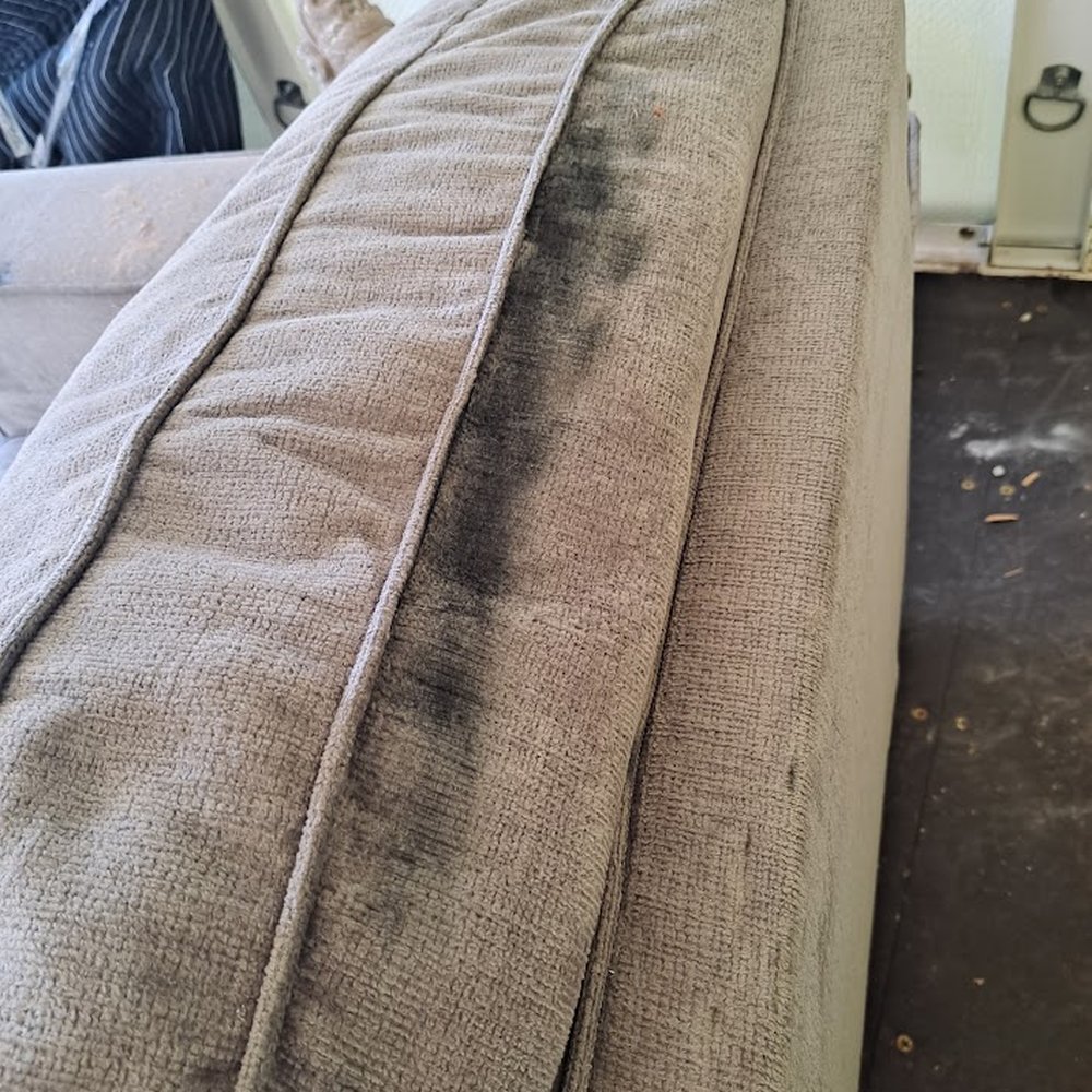 All My Sons Moving & Storage - Top of unprotected lounge chair stained by greasy residue - Self Storage Near Me - Phoenix, Arizona All My Sons Moving & Storage - Top of unprotected lounge chair stained by greasy residue - Self Storage Near Me - Phoenix, Arizona
