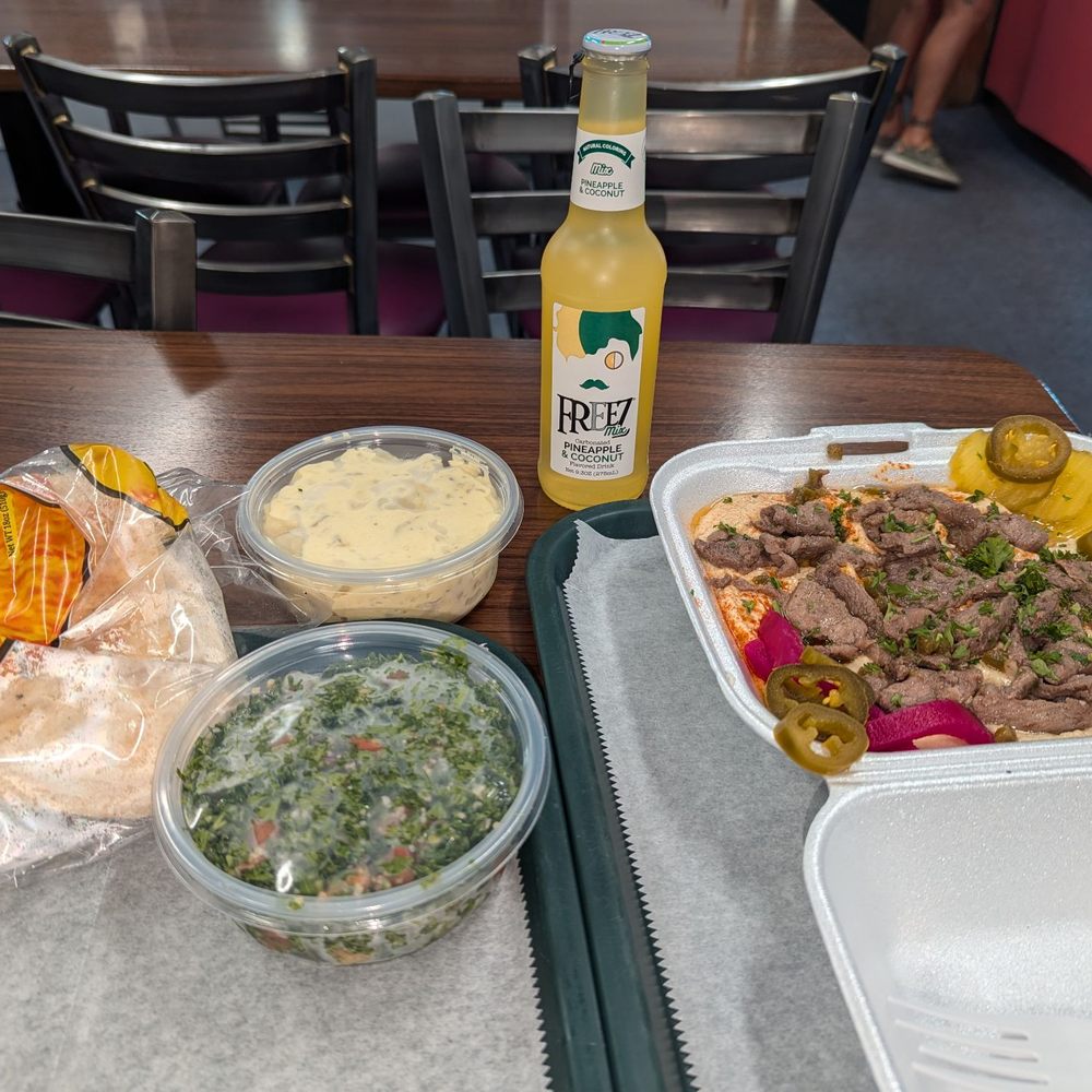 Wally's Gyros & Subs - Hummus with spicy lamb. Tabouleh and potato salad and a new coconut pineapple drink. - New American Near Me - Jacksonville, Florida Wally's Gyros & Subs - Hummus with spicy lamb. Tabouleh and potato salad and a new coconut pineapple drink. - New American Near Me - Jacksonville, Florida