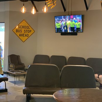 Schoolhouse Brewing - Bus seats in the brewery - Breweries Near Me - Marietta, Georgia
