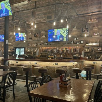 Prohibition Kitchen - Bar and table area - Bars Near Me - St. Augustine, Florida
