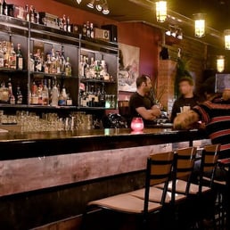 people sitting at a bar
