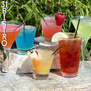 31 Bistro - a variety of cocktails on a table - American Near Me - Wooster, Ohio 31 Bistro - a variety of cocktails on a table - American Near Me - Wooster, Ohio