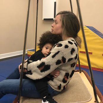 All Bright Therapies - Saint loves the swing at the clinic and his therapist. - Speech Therapists Near Me - Chicago, Illinois