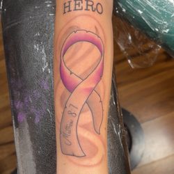 Purple Orchid Tattoo and Piercing - Tattoo
