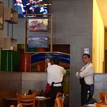 Fogón do Brasil - Watching wrestling on TV is way better than doing your job! No tip for you! - Brazilian Near Me - Zapopan, JAL