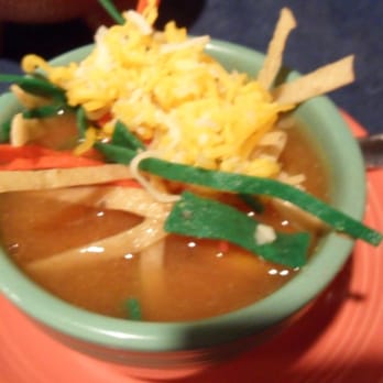 Los Domingos - Tortilla strip chips and cheese on top of the Chicken Tortilla Soup... - Mexican Near Me - Barstow, California