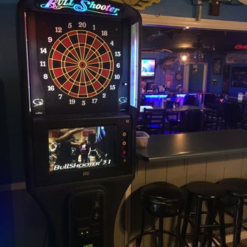 Wigglers Bar & Grill - a dartboard and bar stools - Sports Bars Near Me - Edwardsville, Illinois Wigglers Bar & Grill - a dartboard and bar stools - Sports Bars Near Me - Edwardsville, Illinois